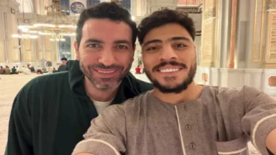 صورة نجوم الأهلي يعلقون على صورة أكرم توفيق ومحمد أبو تريكة