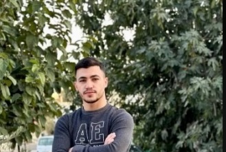 صورة شهيد برصاص المستوطنين في دير جرير شرق رام الله