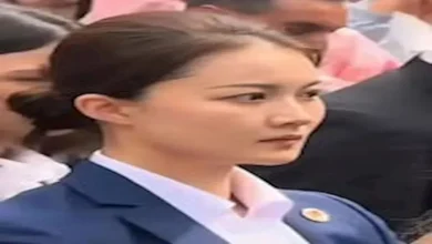 صورة معلومات عن الحارسة الصينية التي ظهرت مع زوجة ماكرون؟